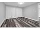 Bedroom features hardwood floors and double door closets at 3151 S Bumby Ave, Orlando, FL 32806