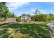 Quaint house featuring a well-manicured lawn and privacy fence, offering a serene curb appeal at 3151 S Bumby Ave, Orlando, FL 32806