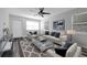 Inviting living room showcasing modern decor, plush seating, and ample natural light at 3151 S Bumby Ave, Orlando, FL 32806