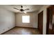 Bedroom featuring tile floors, a ceiling fan, window and closet at 39 Fellowship Dr, Palm Coast, FL 32137