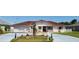Charming single-story home featuring a red tile roof and stucco exterior, with a well-manicured front yard at 39 Fellowship Dr, Palm Coast, FL 32137