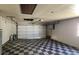 Spacious garage featuring checkered flooring and a bright window at 39 Fellowship Dr, Palm Coast, FL 32137