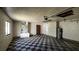 Spacious garage featuring checkered flooring and a bright window at 39 Fellowship Dr, Palm Coast, FL 32137