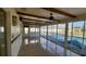 Enclosed sunroom featuring tile floors, a ceiling fan and a view of the yard at 39 Fellowship Dr, Palm Coast, FL 32137