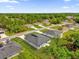 Scenic aerial shot of a neighborhood, with houses surrounded by lush greenery at 3984 Sw 151St St, Ocala, FL 34473