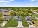 Stunning aerial view of a gray single-Gathering home with a well-manicured lawn at 3984 Sw 151St St, Ocala, FL 34473