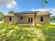 This home boasts a covered porch and spacious backyard at 501 Mulberry St, Fruitland Park, FL 34731