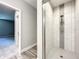 Bathroom featuring a tiled shower at 501 Mulberry St, Fruitland Park, FL 34731