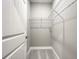 Walk in closet with ample shelving space at 501 Mulberry St, Fruitland Park, FL 34731