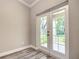 An inviting room with French doors offer access to the outdoor patio and backyard at 501 Mulberry St, Fruitland Park, FL 34731