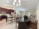 Inviting living space connecting kitchen, dining, and lounge with stylish decor at 509 Mulberry St, Fruitland Park, FL 34731