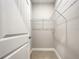A walk-in closet with wire shelving and neutral carpeting at 509 Mulberry St, Fruitland Park, FL 34731
