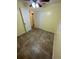 Bedroom featuring tile flooring, a ceiling fan, and neutral yellow-painted walls at 6427 Breezewood St, Orlando, FL 32818