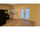 Functional kitchen featuring white cabinets and plenty of counter space at 6427 Breezewood St, Orlando, FL 32818
