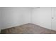 Bedroom with neutral carpet, white walls, and double door closet at 660 Silver Palm Dr, Haines City, FL 33844