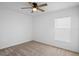 Well-lit bedroom featuring a ceiling fan and a window with bright natural light at 660 Silver Palm Dr, Haines City, FL 33844