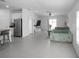 Bright and open living space with tile floors, neutral walls, and lots of natural light at 660 Silver Palm Dr, Haines City, FL 33844