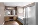 Bathroom featuring dual sinks, soaking tub, and separate shower at 745 Riggs Cir, Davenport, FL 33897