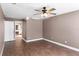 Spacious bedroom with ceiling fan and bright window at 745 Riggs Cir, Davenport, FL 33897