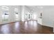 Bright and airy living room with tile floors, large windows and access to the backyard at 745 Riggs Cir, Davenport, FL 33897