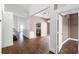 Inviting living room with wood-look tile flooring and an open concept layout at 745 Riggs Cir, Davenport, FL 33897