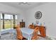 Dining area featuring a vintage cabinet and a backyard view through sliding glass doors at 7536 Sw 77Th Ave, Ocala, FL 34481