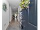 Welcoming entryway with stylish decor, tile flooring, and a view into the living spaces beyond at 7536 Sw 77Th Ave, Ocala, FL 34481