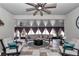 Charming patio with stylish outdoor furniture, ceiling fan, and neutral decor at 9210 Sw 60Th Court Rd, Ocala, FL 34476
