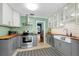 Bright kitchen with butcher block countertops, stainless steel appliances, and ample cabinet space at 926 Mayfair Cir, Orlando, FL 32803