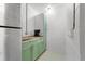Kitchenette featuring green cabinetry, butcher block countertops, and modern coffee maker at 926 Mayfair Cir, Orlando, FL 32803