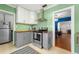 Efficient kitchen layout featuring butcher block countertops, stainless appliances, and modern accents at 926 Mayfair Cir, Orlando, FL 32803
