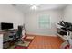Office space featuring a desk, chair, computer, ceiling fan and accent rug at 926 Mayfair Cir, Orlando, FL 32803