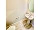 Cozy bathroom with a pedestal sink, and wood-look flooring at 2834 Narcoossee Commons Way, St Cloud, FL 34771