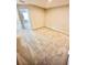 A well-lit bedroom has neutral paint, plush carpet, and a hallway entrance at 2834 Narcoossee Commons Way, St Cloud, FL 34771