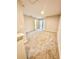 A well-lit hallway has neutral paint and plush carpet with doors to rooms off the hallway at 2834 Narcoossee Commons Way, St Cloud, FL 34771