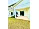 Covered patio area features a sliding glass door, perfect for outdoor relaxation at 2834 Narcoossee Commons Way, St Cloud, FL 34771