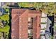 Aerial view of the roof, patios, and landscaping of a townhome complex at 6218 Forsythe Loop, Sanford, FL 32771