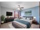 Serene bedroom with modern furniture, soft lighting, and decorative accents at 947 N Atmore Cir, Deltona, FL 32725