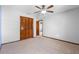 Bedroom with closet, carpet, and a ceiling fan at 947 N Atmore Cir, Deltona, FL 32725