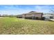 Charming single-story brick home featuring manicured front yard landscaping at 947 N Atmore Cir, Deltona, FL 32725