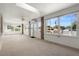 Light-filled sunroom with ample windows and brick accent walls creates a comfortable atmosphere at 947 N Atmore Cir, Deltona, FL 32725