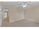 Neutral bedroom with carpeted floors, and a ceiling fan with light fixture at 1056 Royal Saint George Dr, Orlando, FL 32828