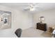 Spacious bedroom featuring a dresser and access to an adjacent room that offers versatility and functionality at 1056 Royal Saint George Dr, Orlando, FL 32828
