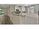 Kitchen features granite countertops, stainless steel appliances and modern cabinetry at 1056 Royal Saint George Dr, Orlando, FL 32828