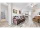 Spacious living room with hardwood flooring, comfortable seating, and natural light at 1056 Royal Saint George Dr, Orlando, FL 32828