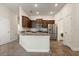 Modern kitchen features stainless steel appliances, granite countertops, and ample cabinet space at 2257 Pecos Ct, Kissimmee, FL 34759