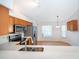 Bright kitchen features stainless steel appliances, granite countertops, and a dining area at 2637 Shelby Ruth Pl, St Cloud, FL 34769