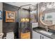 Modern bathroom features a walk-in shower, wood accents, and a stylish vanity at 878 W Timberland Trl, Altamonte Springs, FL 32714