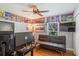 Bedroom with a futon, hardwood floors, and a large window at 878 W Timberland Trl, Altamonte Springs, FL 32714