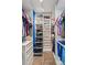 Walk-in closet features custom shelving, drawers, and ample storage space at 878 W Timberland Trl, Altamonte Springs, FL 32714